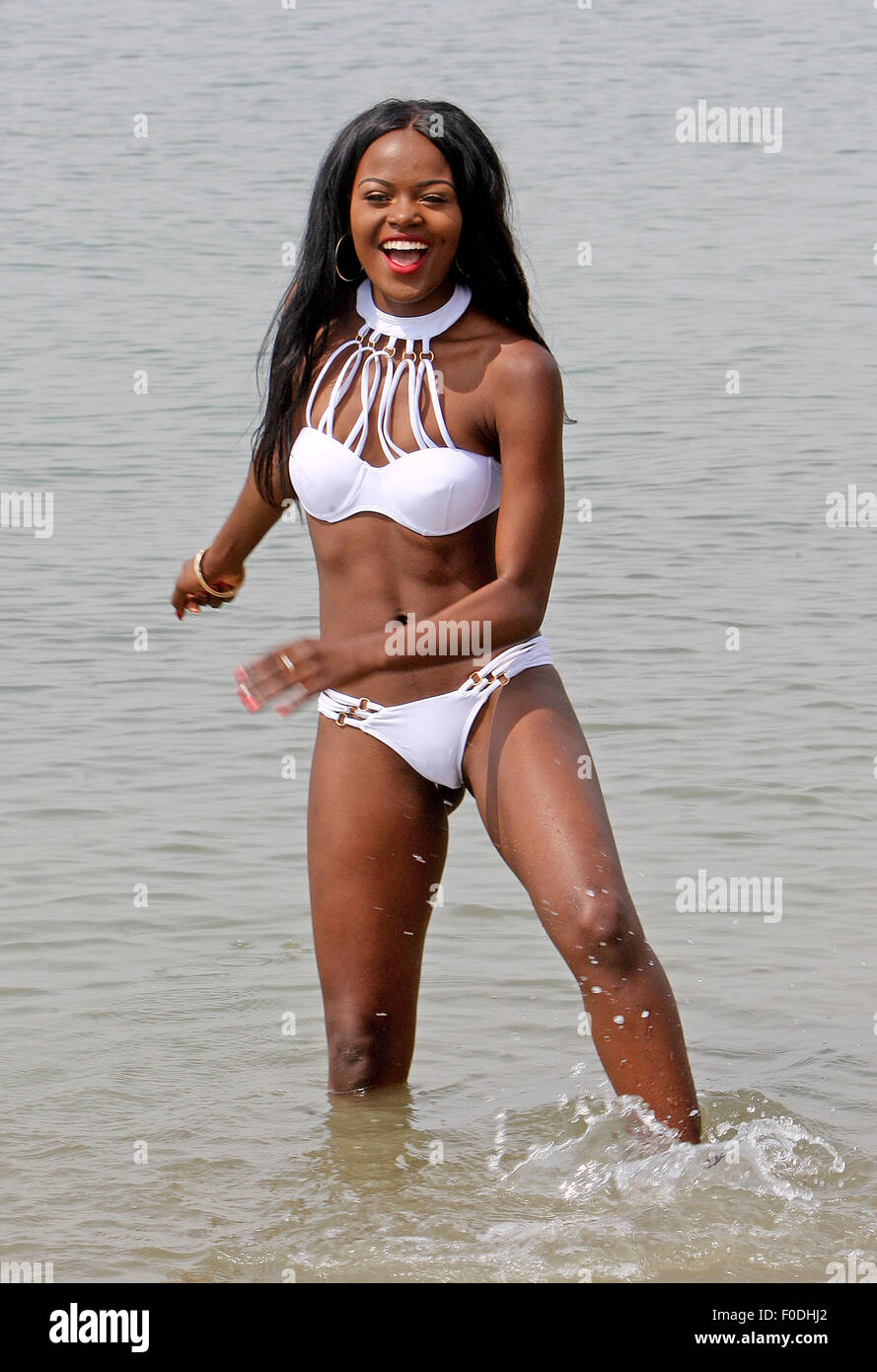 20-year-old dancer, Sherrie Silver from Southend enjoys the sunshine at Chalkwell Beach, Essex.  Featuring: Sherie Silver Where: Chalkwell Beach, United Kingdom When: 12 Jun 2015 Stock Photo