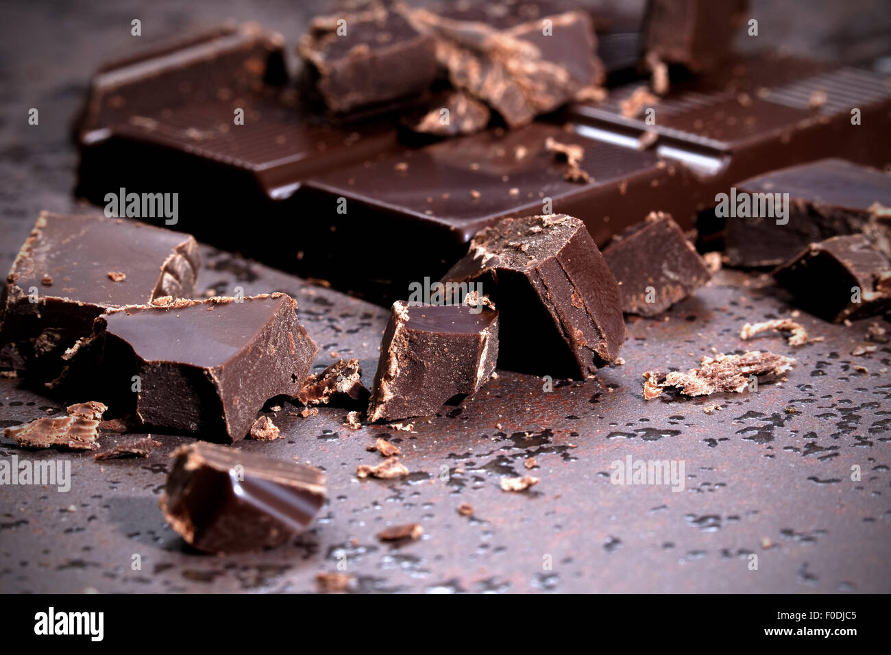 Dark chocolate on a stone table Stock Photo