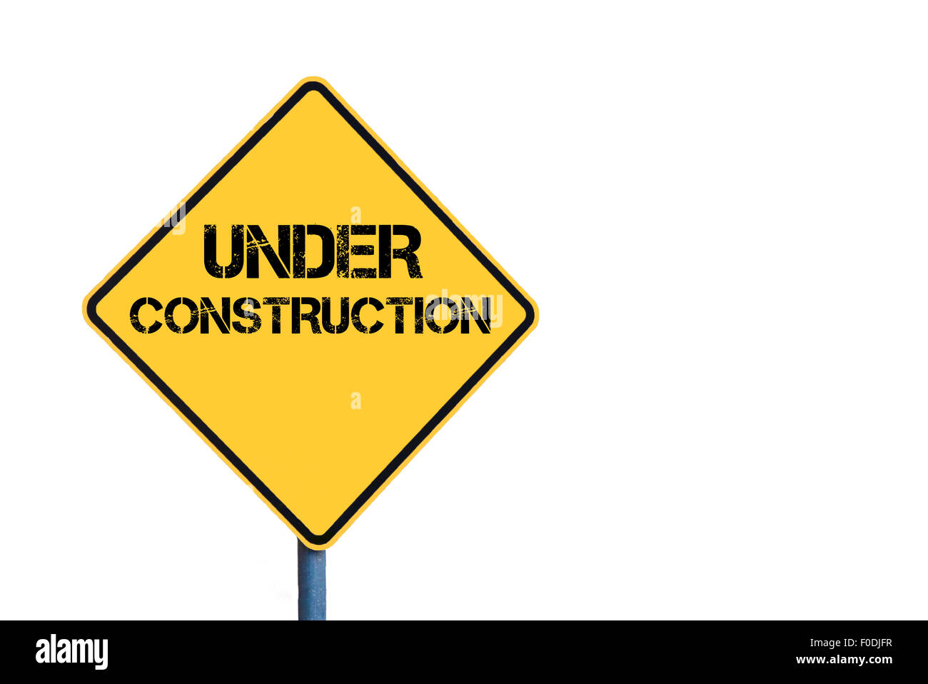 Yellow roadsign with Under Construction message isolated on white background Stock Photo Alamy