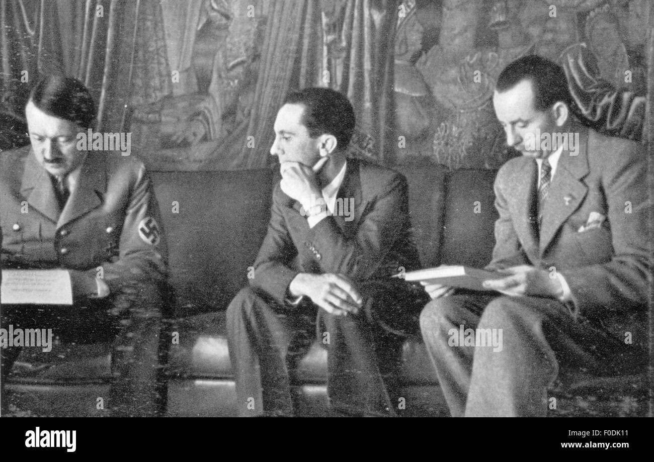 Hitler, Adolf, 20.4.1889 - 30.4.1945, German politician,  (, NSDAP), Chancellor of the Reich 30.1.1933 - 30.4.1945, with Joseph Goebbels and Otto Dietrich, Chancellery of the Reich, Berlin, circa 1935, Stock Photo