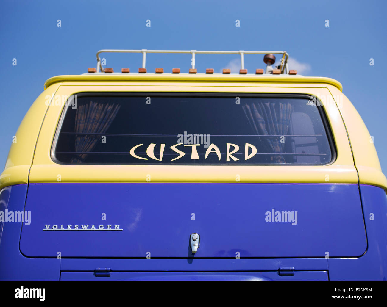 Purple and yellow VW Volkswagen camper van called Custard.  England Stock Photo