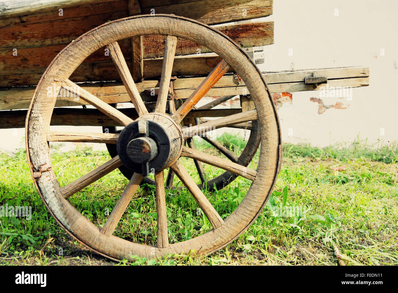 Wheel of old wooden cart taken closeup Stock Photo - Alamy