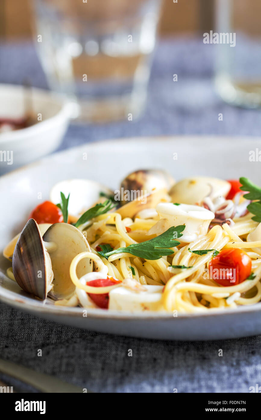 Spaghetti with squid, clam and prawn by sea salt Stock Photo Alamy