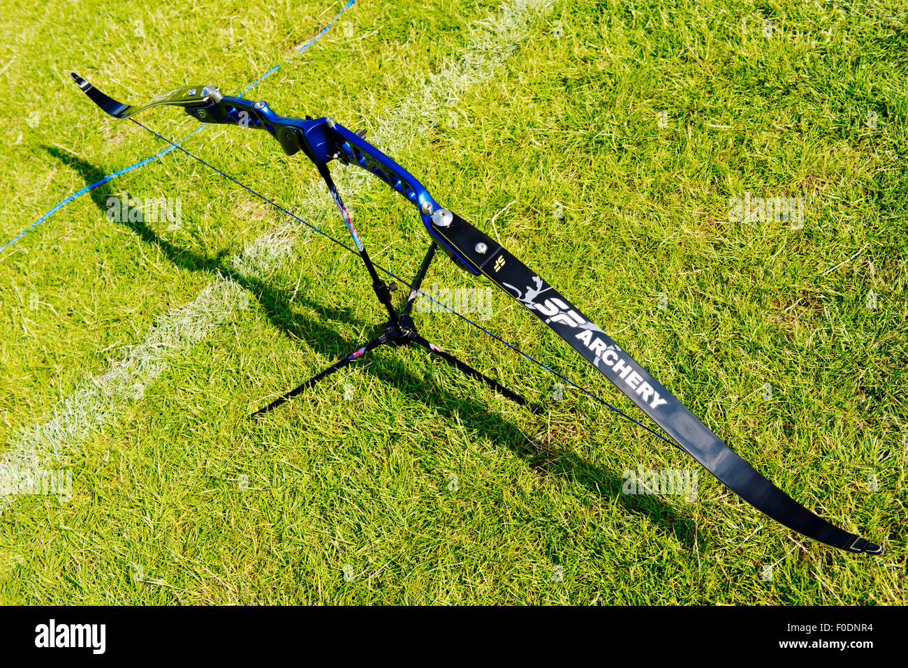 Recurve archery bow close-up resting on stand during competition Stock Photo