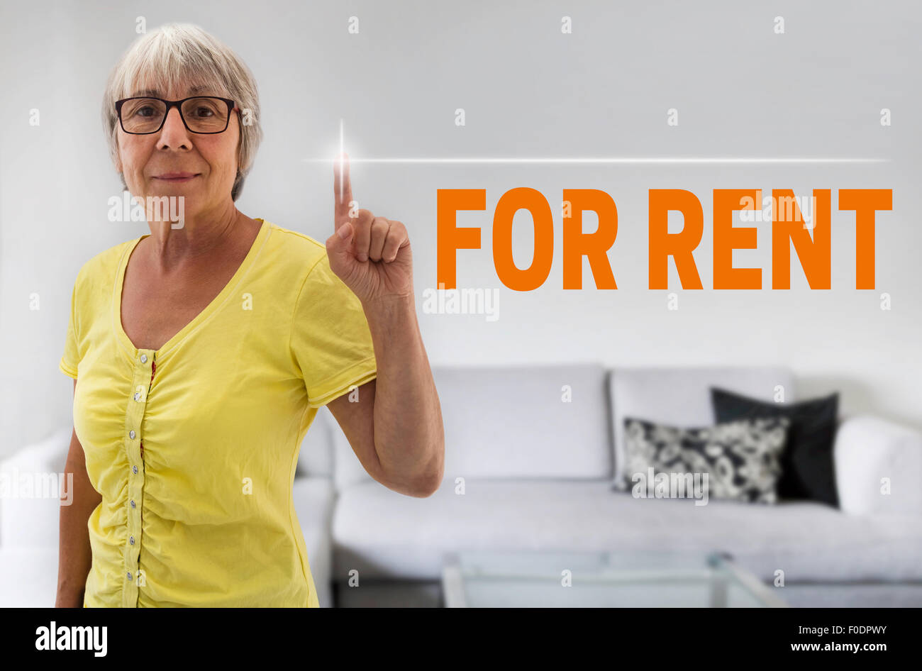 for rent touchscreen is shown by senior. Stock Photo