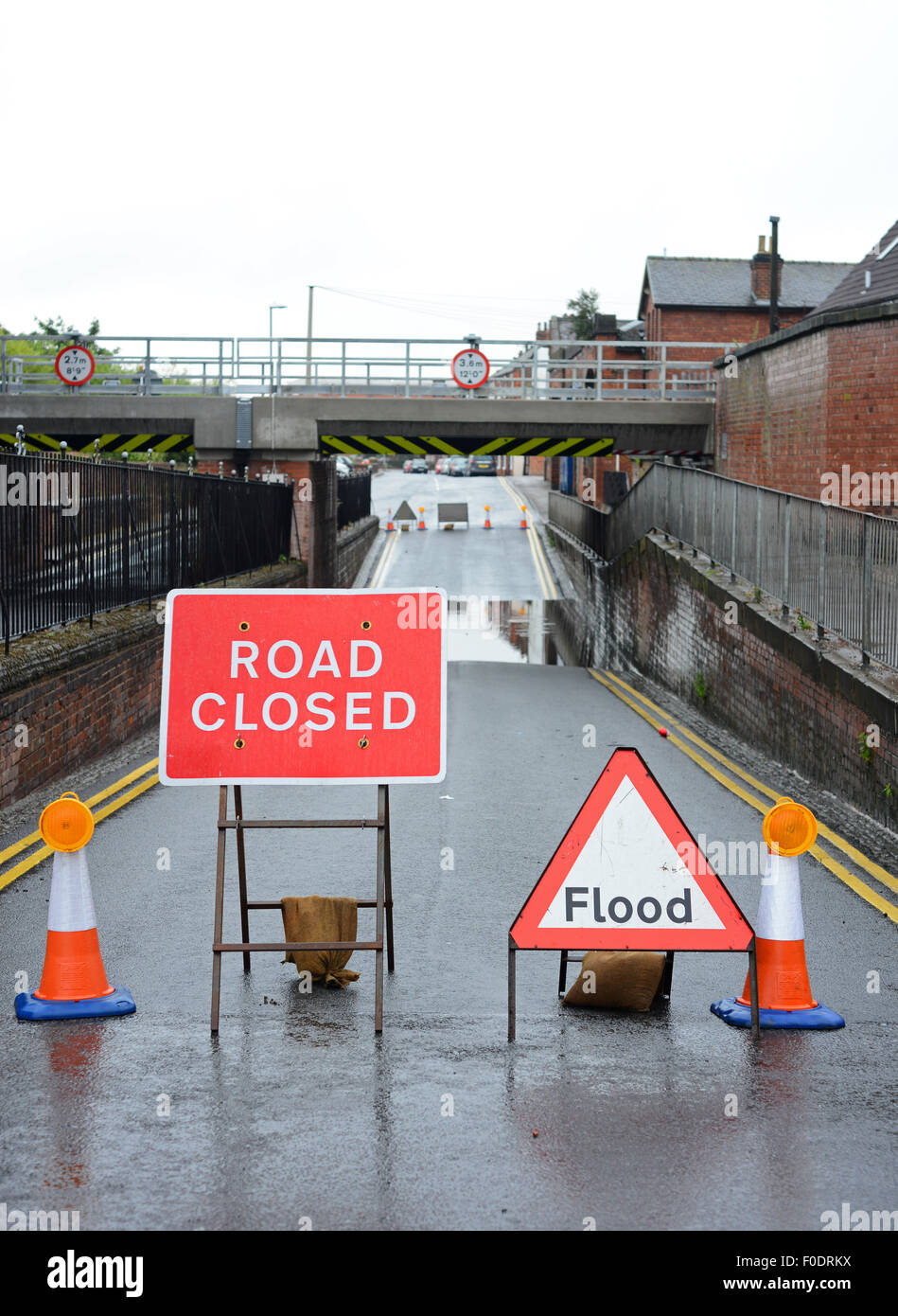 road closed and flooding warning sign at railway bridge selby yorkshire