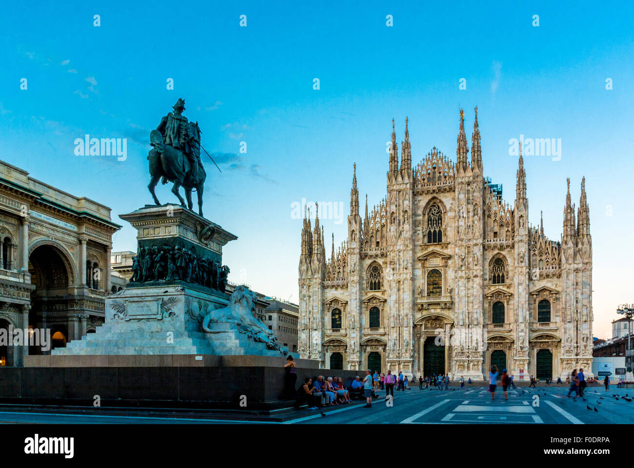 Milan Cathedral with the statue of King Victor Emmanuel II at dusk. Milan, Italy Stock Photo