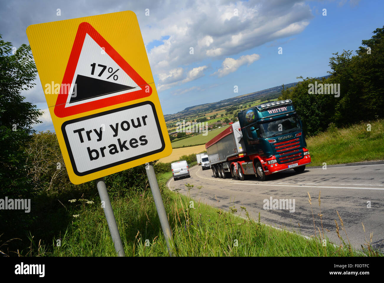 lorry passing try your brakes warning sign above staxton hill yorkshire united kingdom Stock Photo
