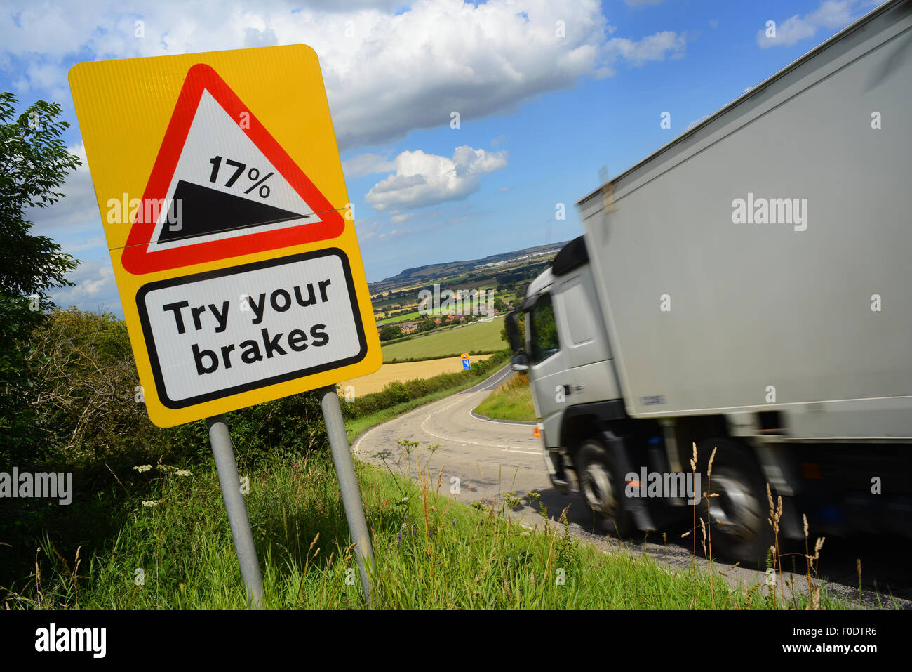 lorry passing try your brakes warning sign above staxton hill yorkshire united kingdom Stock Photo
