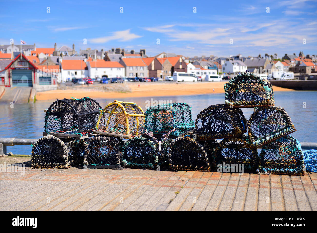 Lobster pots on quayside of picturesque fishing village of Anstruther