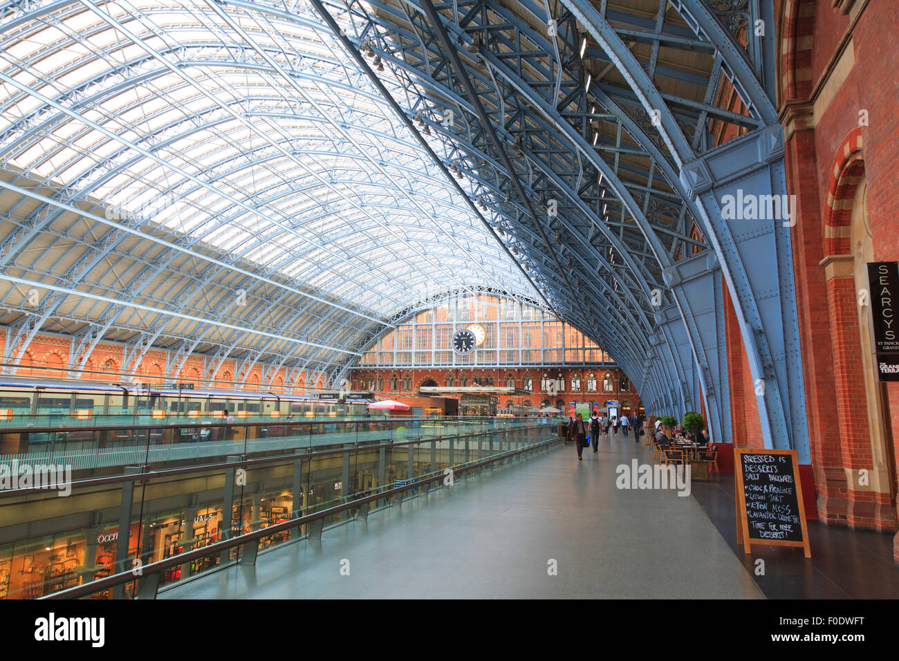Inside the grade 1 listed St Pancras Railway Station with glazed roof Stock Photo