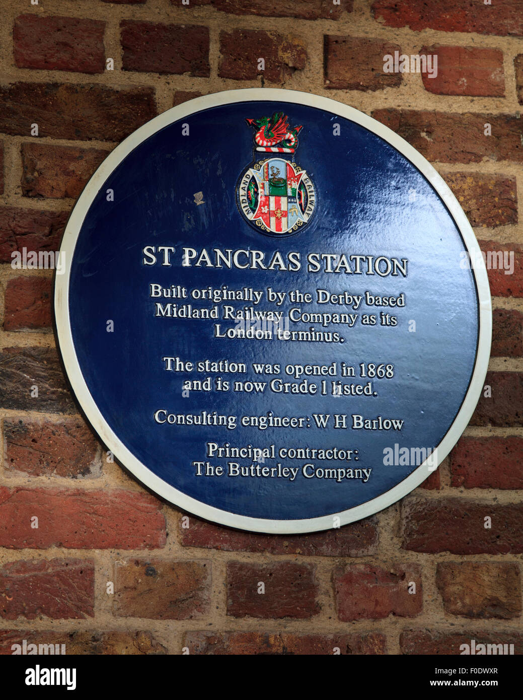 Blue Plaque commerating St Pancras Railway Station built in 1868 now Grade 1 Listed Stock Photo