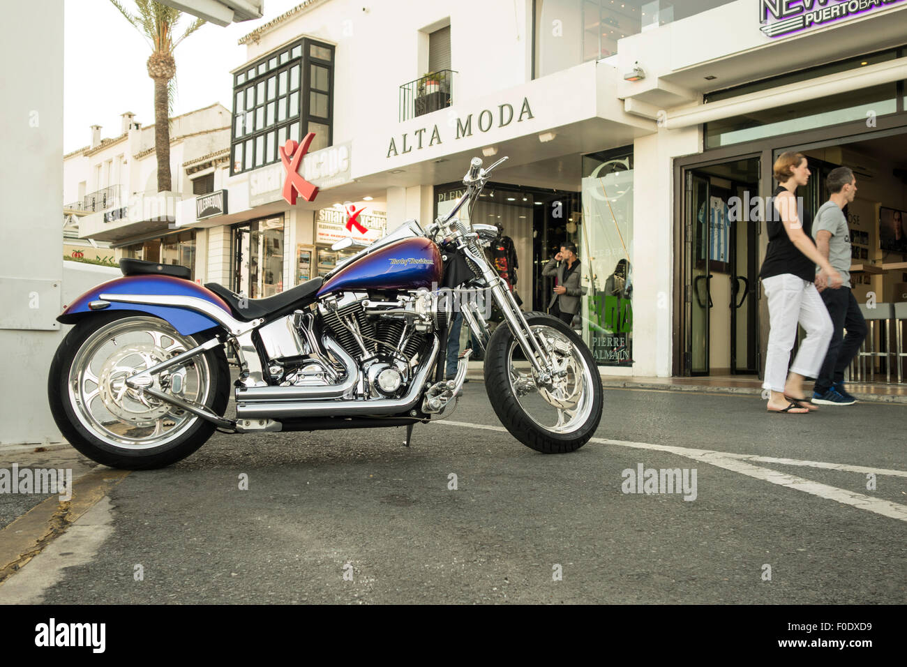 Harley Davidson parked in streets luxury marina Puerto banus, Marbella,  Andalusia, Spain Stock Photo - Alamy