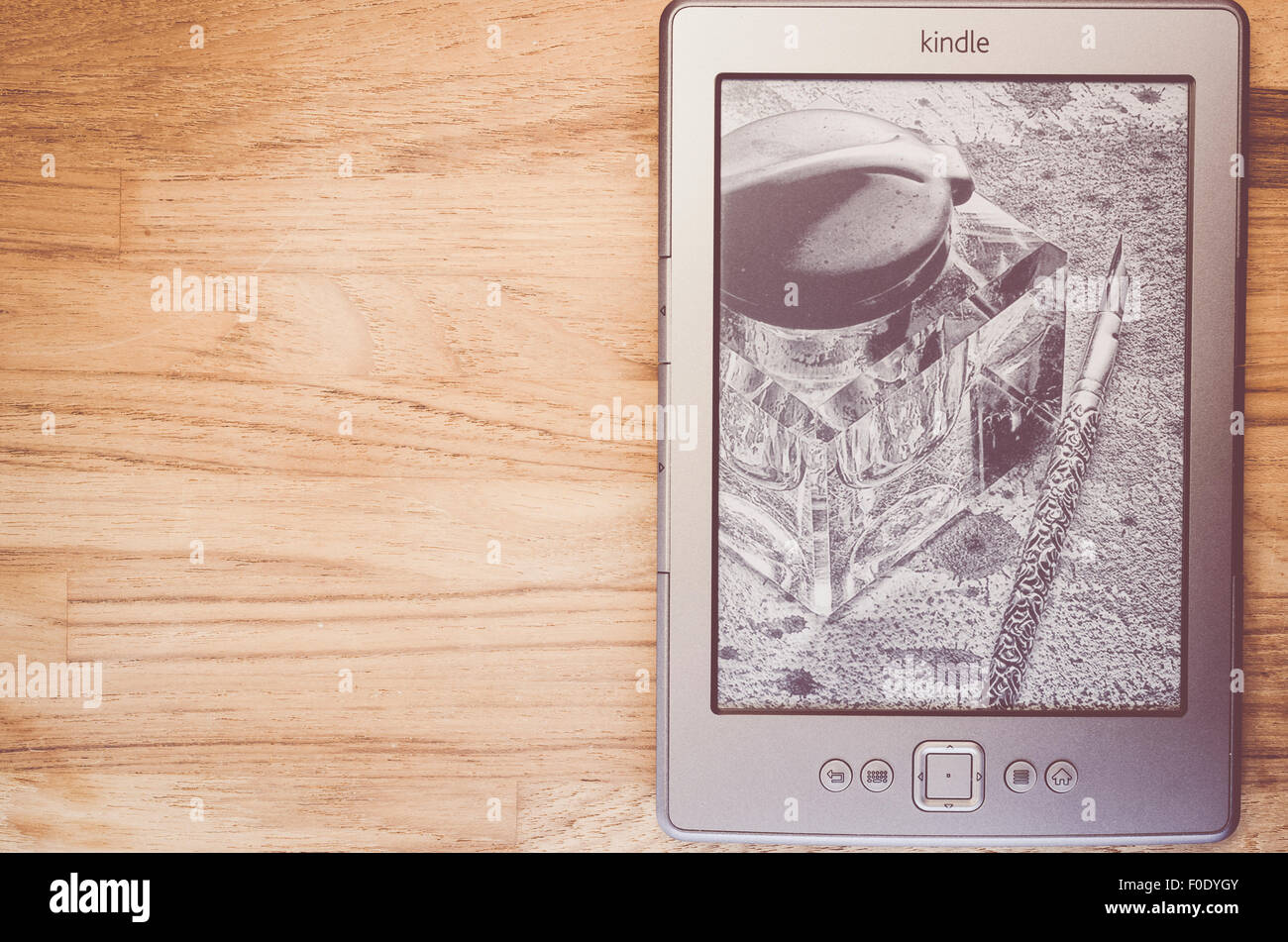 electronic reading device on a natural wood background ebook reader