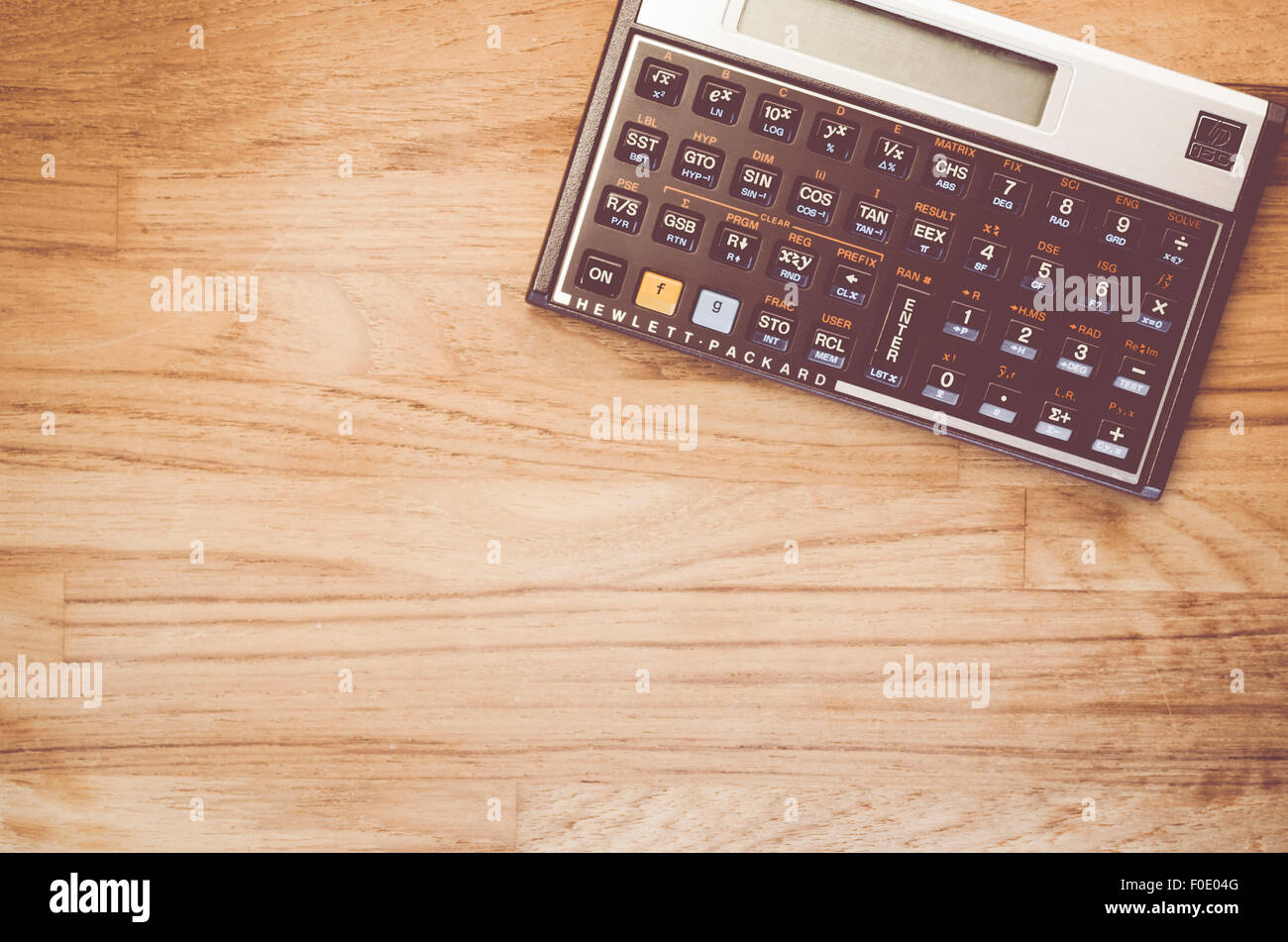Hp 15c Programmable Scientific Calculator On A Natural Wood Surface Stock Photo Alamy