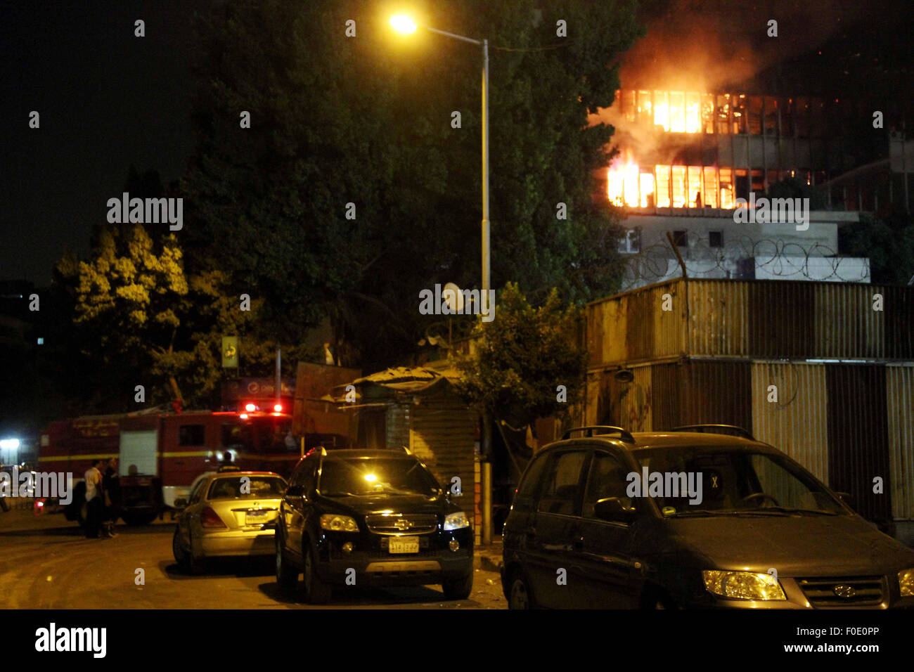 Cairo, Egypt. 12th Aug, 2015. Egyptian firefighters try to extinguish