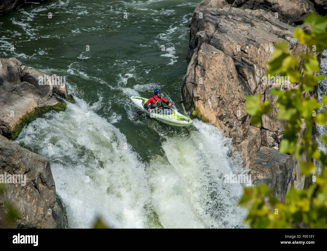 Scenes of two kayakers navigating the chutes at Great Falls National