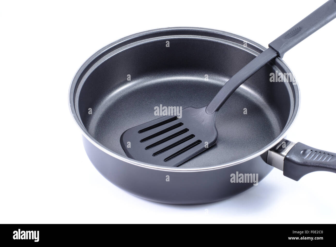 Empty Big Pan And Scoop Or Flipper Used In Frying. Stock Photo