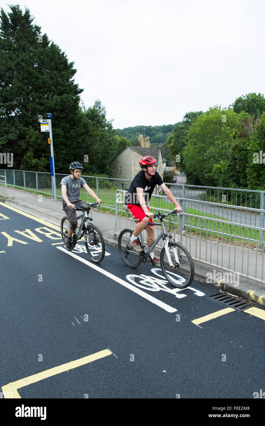 Stroud, UK. 11th Aug, 2015. Britain's shortest cycle lane is painted on a newly tarmacced road between two school bus stops. The lane is opposite a local school to where children and teenagers rides their bikes. Stroud. Gloucestershire. United Kingdom. Credit:  Alexander Caminada/Alamy Live News Stock Photo
