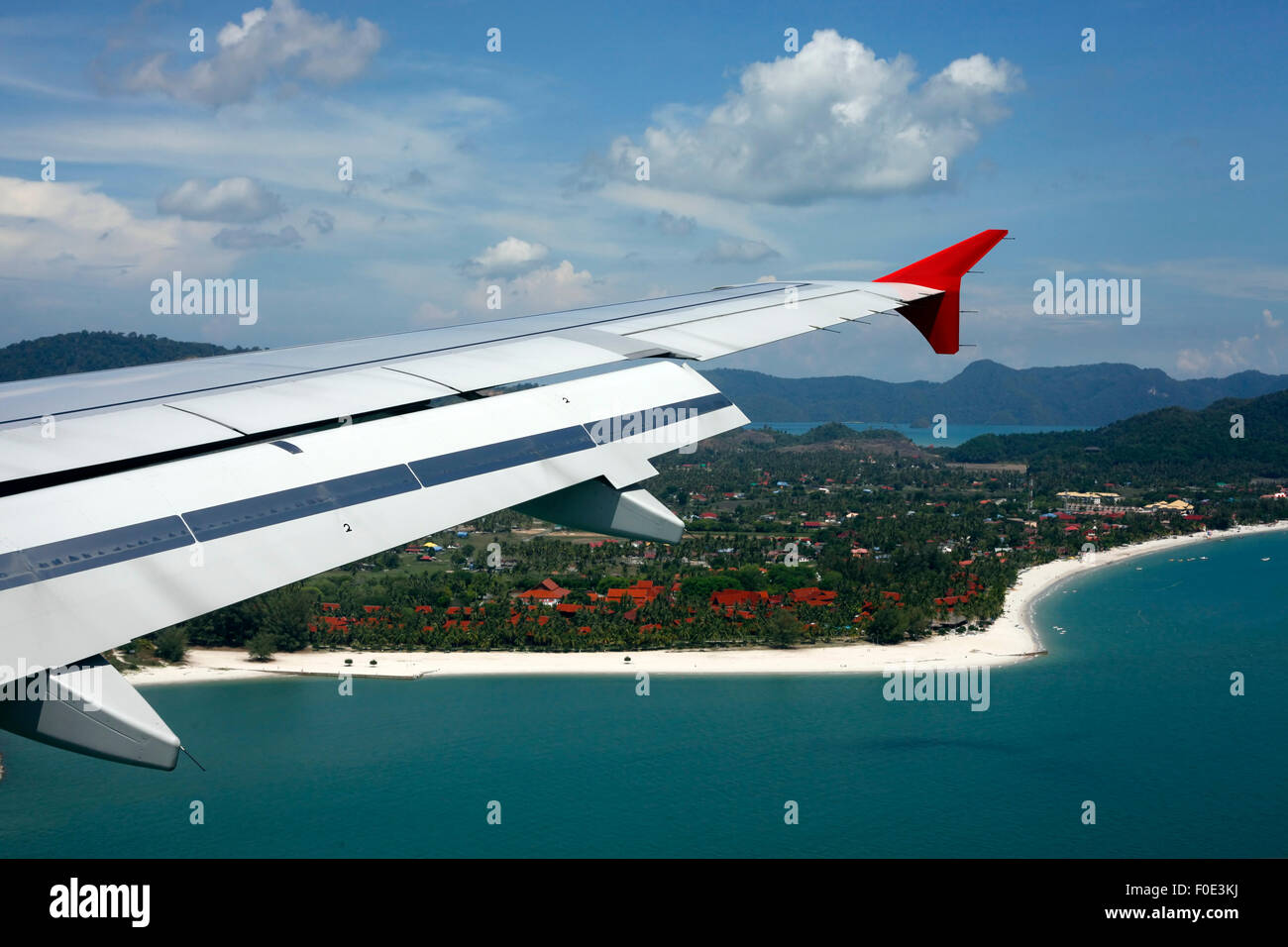 Wing of the plane on a background of island Langkawi Stock Photo