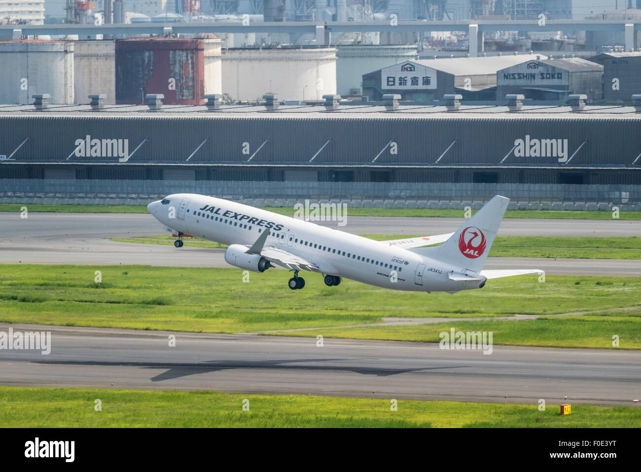Airplane departing from Haneda Airport in Japan Stock Photo