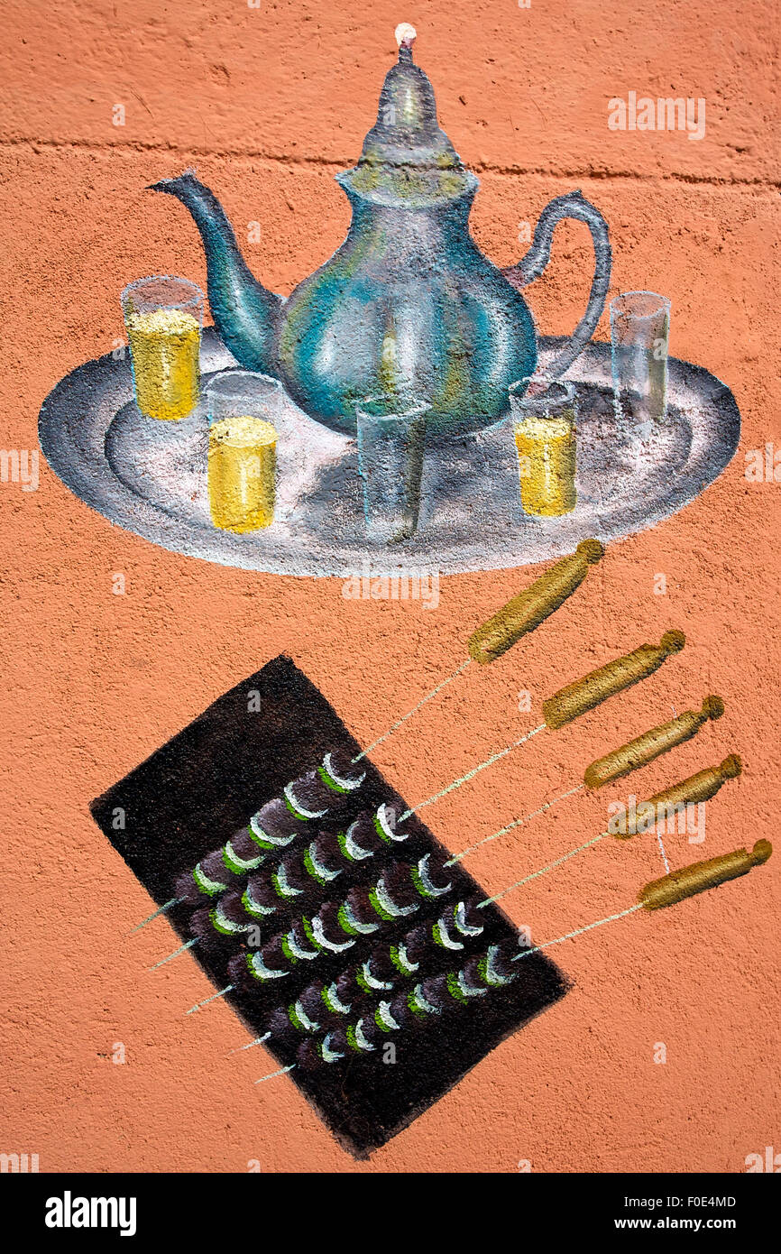 Drawing of traditional Moroccan tea pot, glasses and five meat skewers in Morocco, Agadir. Stock Photo