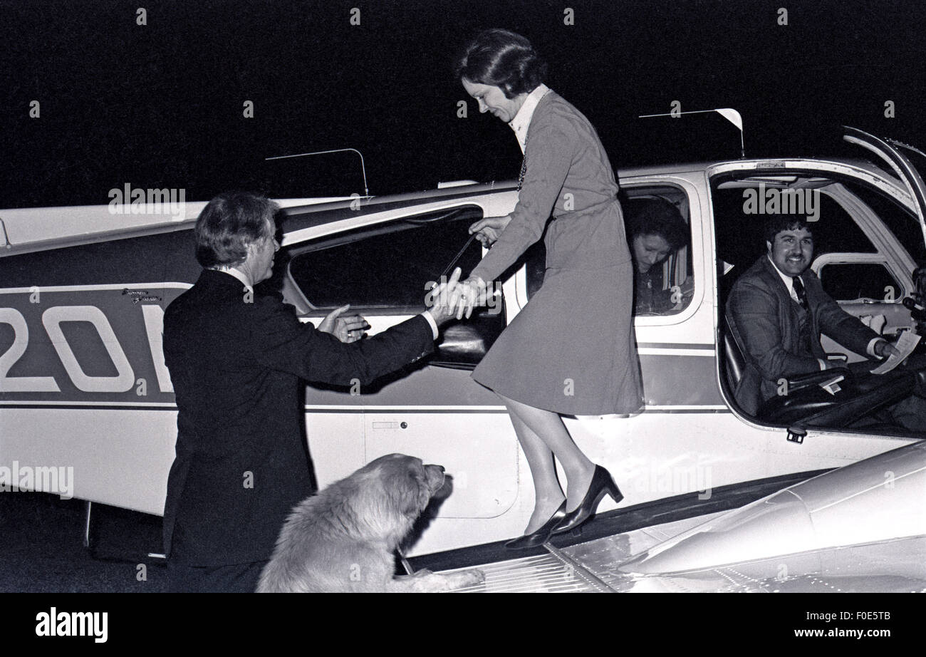 Jan. 2, 1977 - USA - Jimmy and Rosalynn Carter land at a small airport at midnight as they end a day of campaigning in Illinois. The frugal candidate used a small twin engine aircraft during the early months of his 1976 presidential campaign. (Credit Image: © Ken Hawkins via ZUMA Wire) Stock Photo