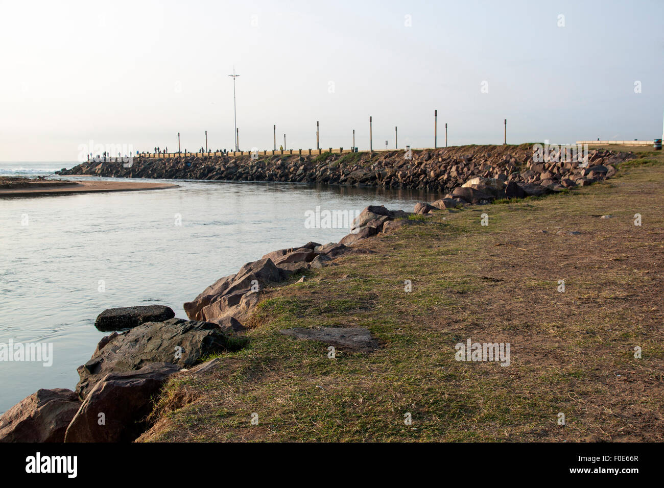 View of Umgeni river mouth and rocky pier at Blue Lagoon in Durban
