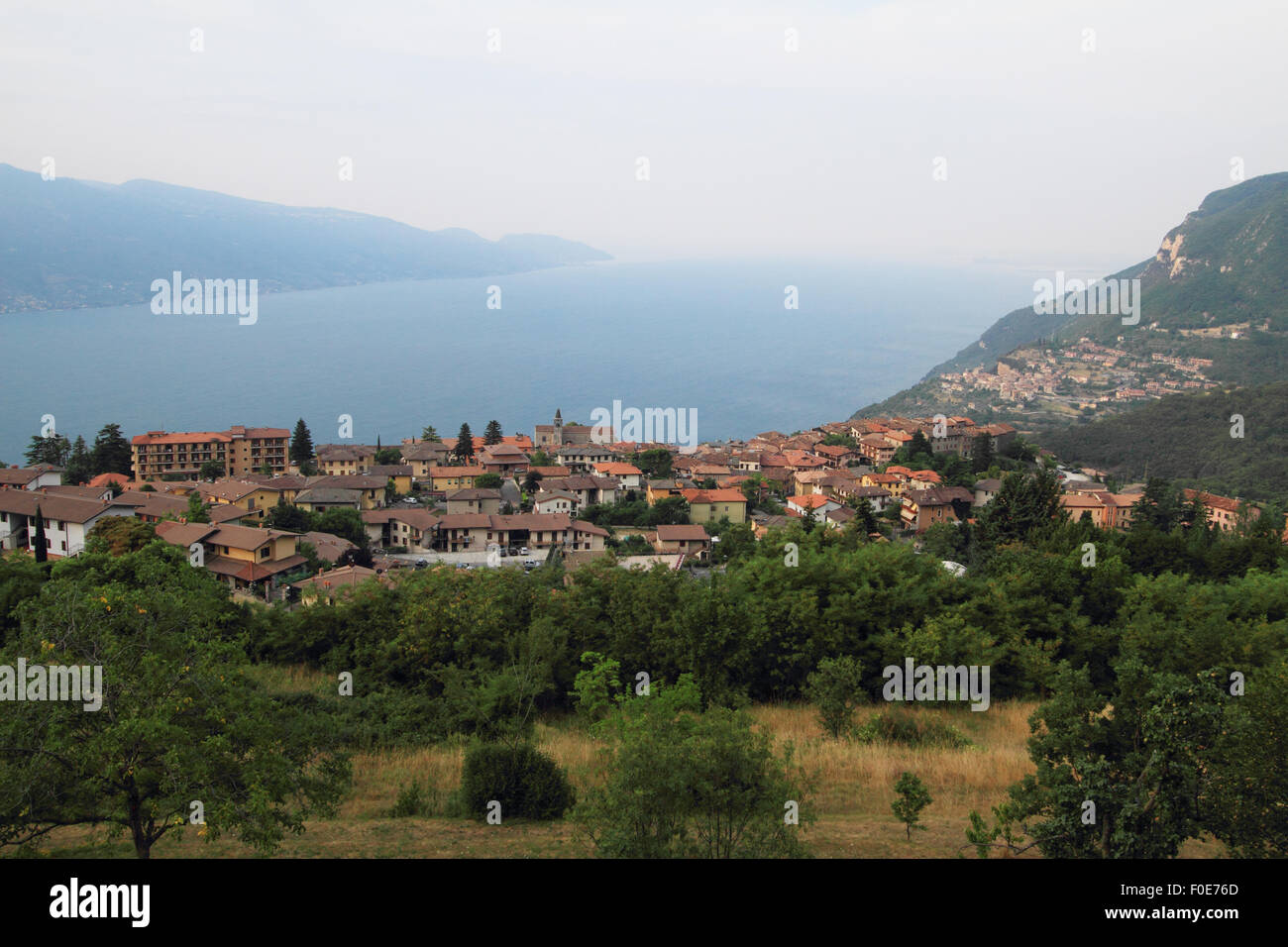 Gardola in Tignale by Lake Garda in Italy. Pair of images photographed just before and just after sunrise (image id F0E76D and F0E76J) Stock Photo