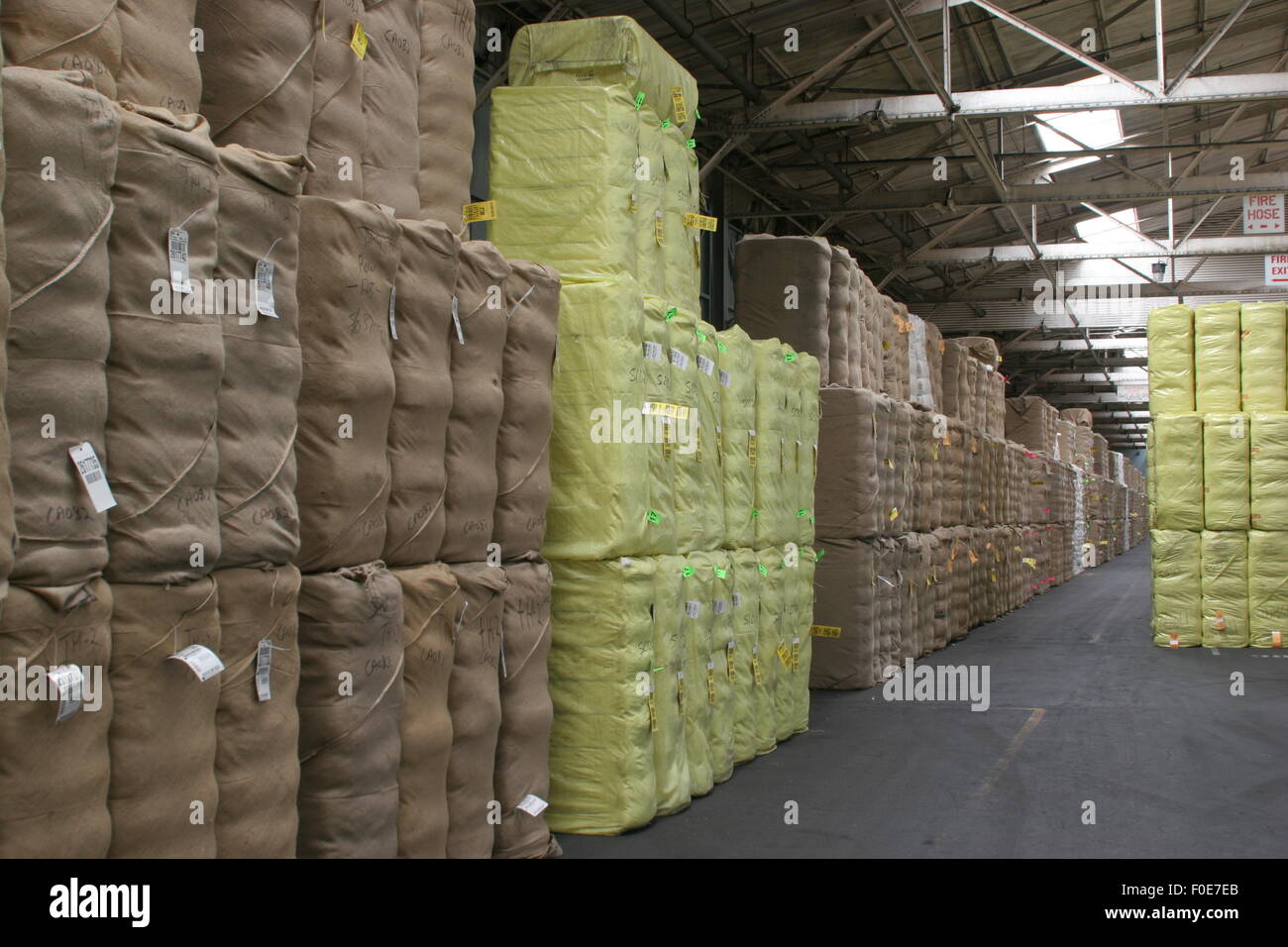 wrapped cotton in warehouse Stock Photo Alamy