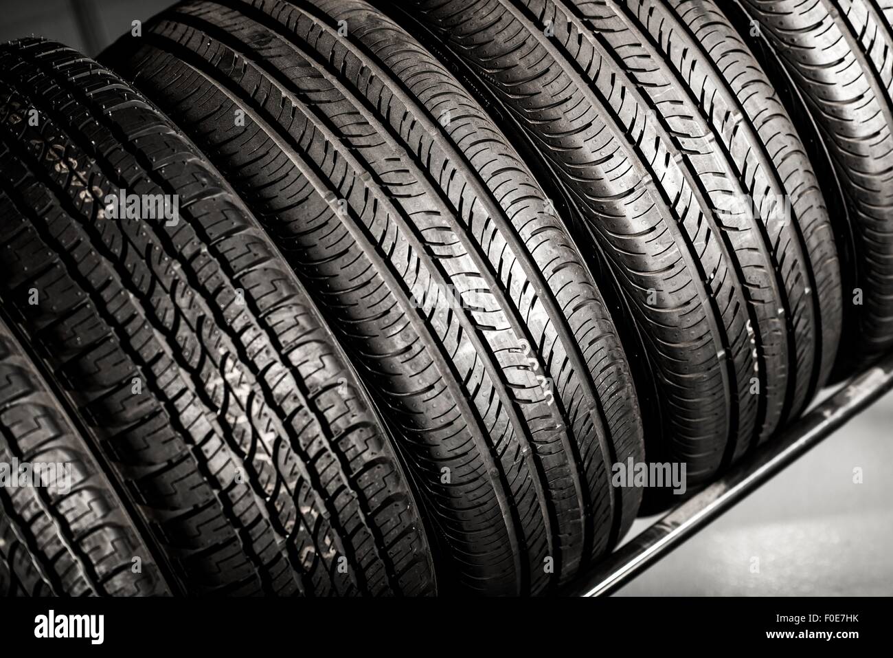 New Compact Vehicles Tires Stack. Winter and Summer Season Tires Stock