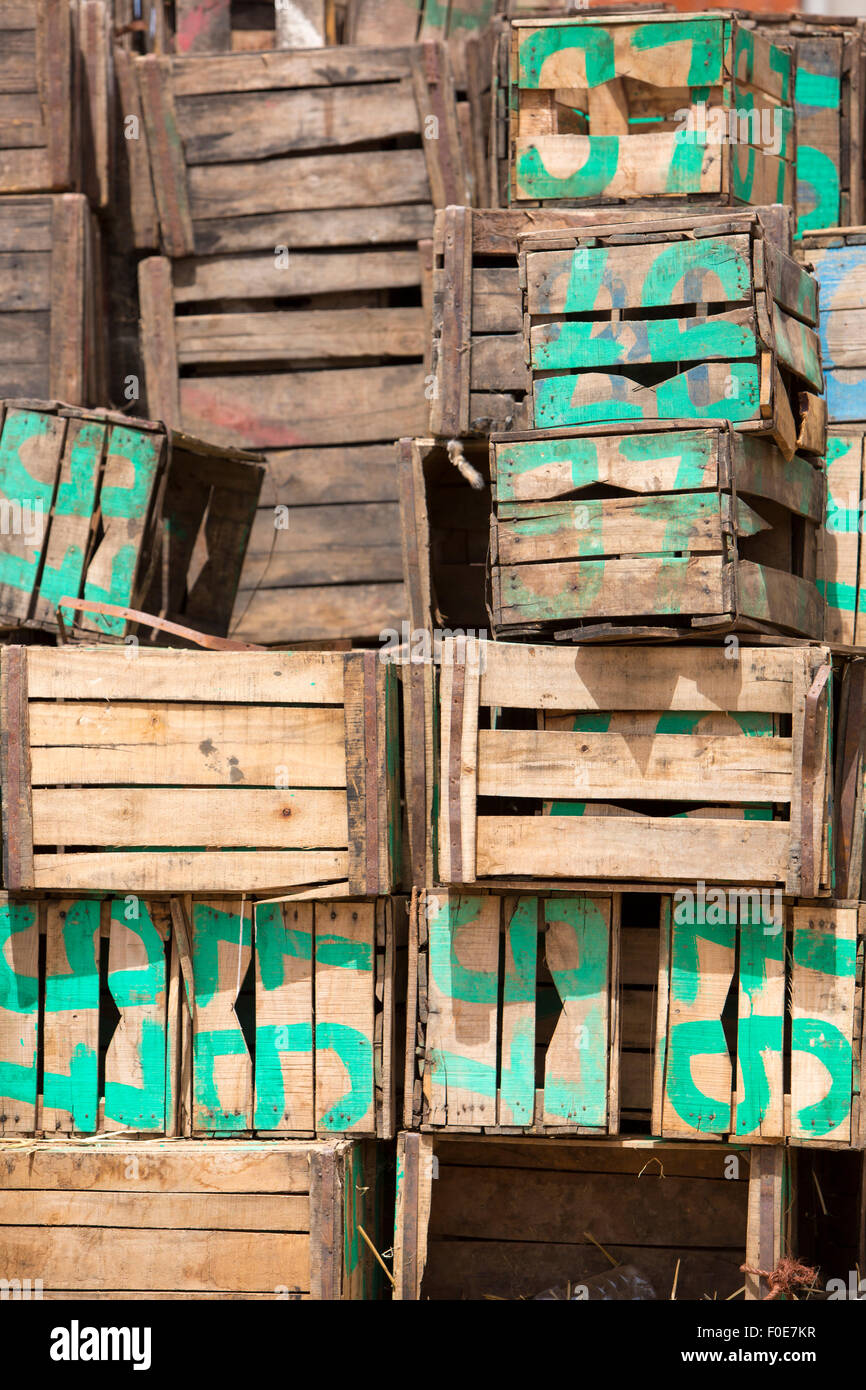Old stacked green and natural wood boxes, Morocco Stock Photo