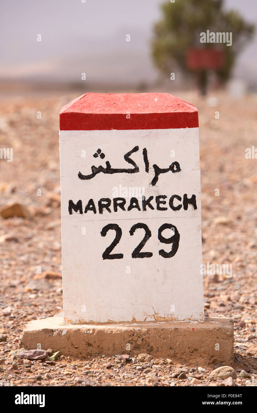 Marrakesh 229 kilometers - roadside distance indicator on the road to Marrakesh, Morocco Stock Photo