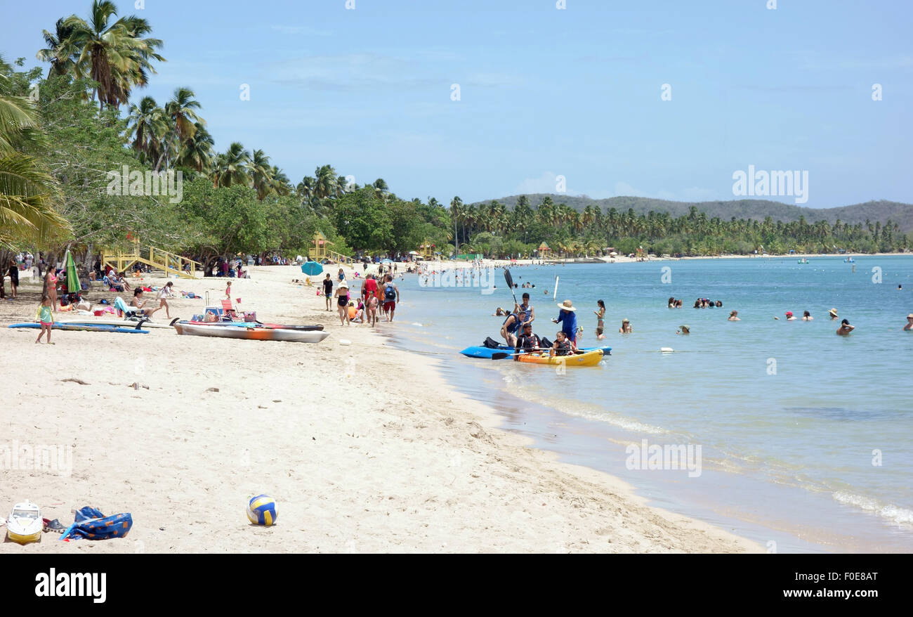 Holiday makers relaxing on the beach at Boqueron Puerto Rico Stock Photo