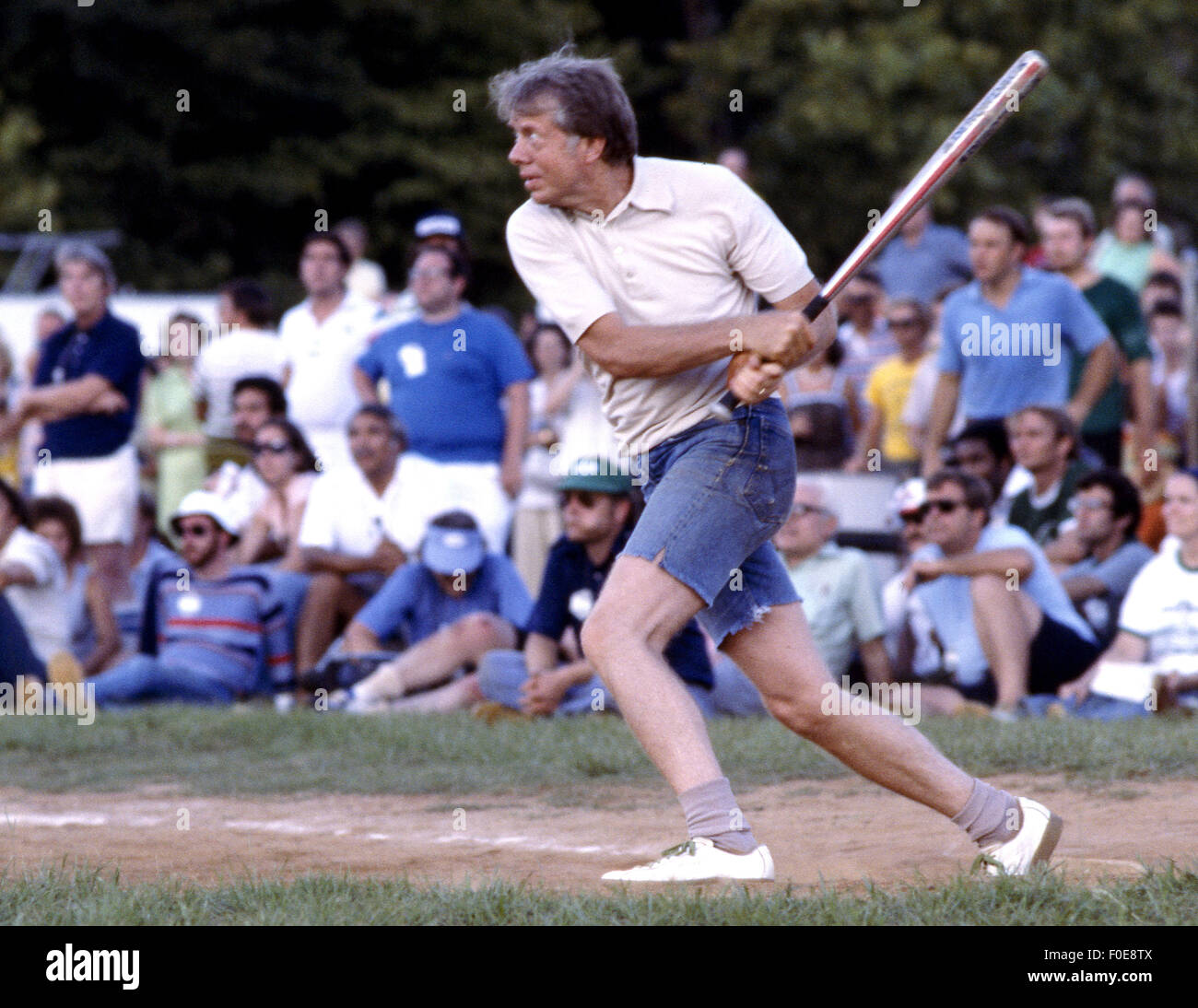 Jan. 2, 1977 - USA - Jimmy Carter plays softball in his hometown of Plains, Georgia. Carter was pitcher and captain of his team that was comprised of off duty U.S. Secret service agents and White House staffers. The opposing team was comprised of members of the White house traveling press and captained by Billy Carter, the president's brother. (Credit Image: © Ken Hawkins via ZUMA Wire) Stock Photo