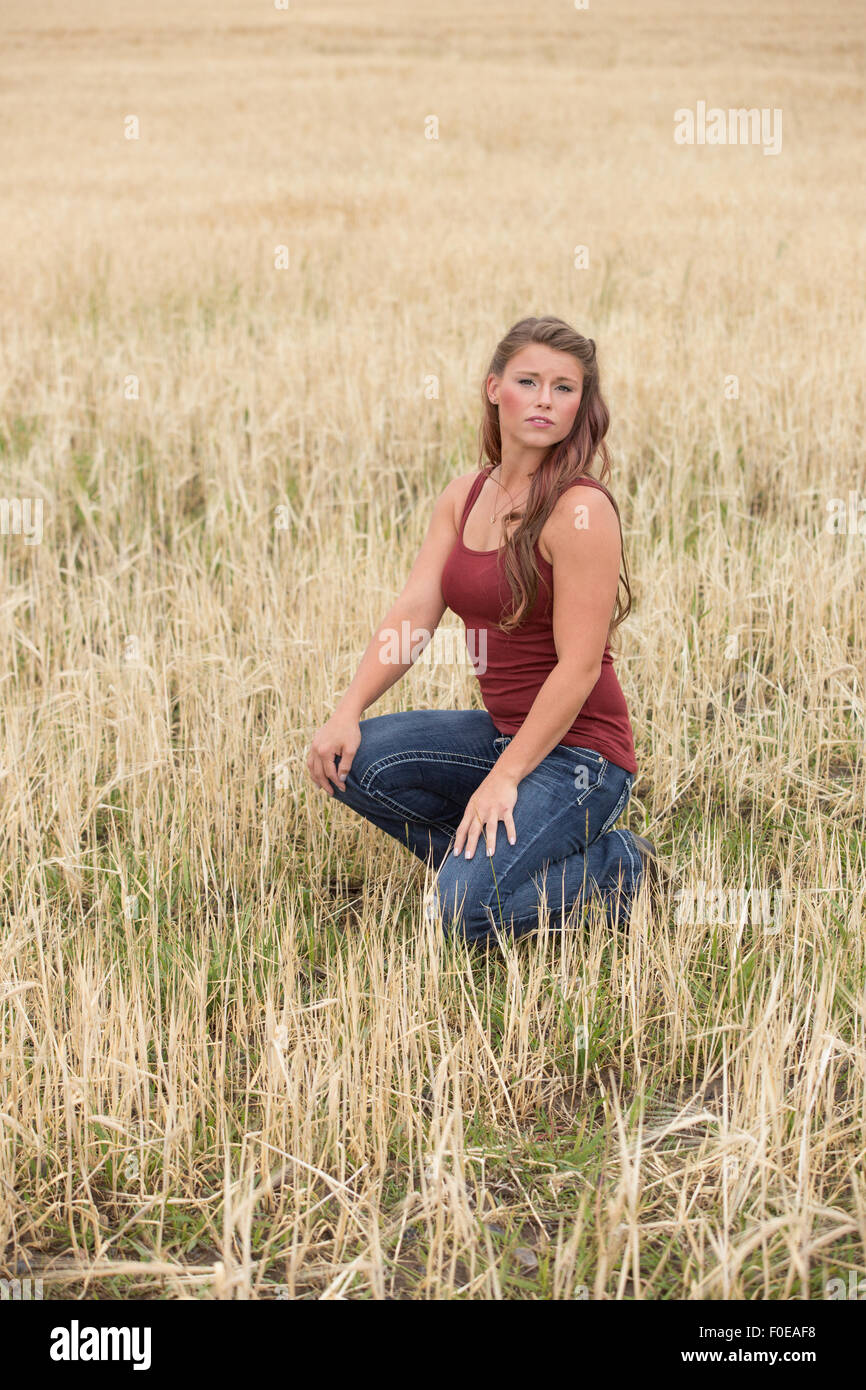 Wearing red top and blue jeans hi-res stock photography and images - Alamy