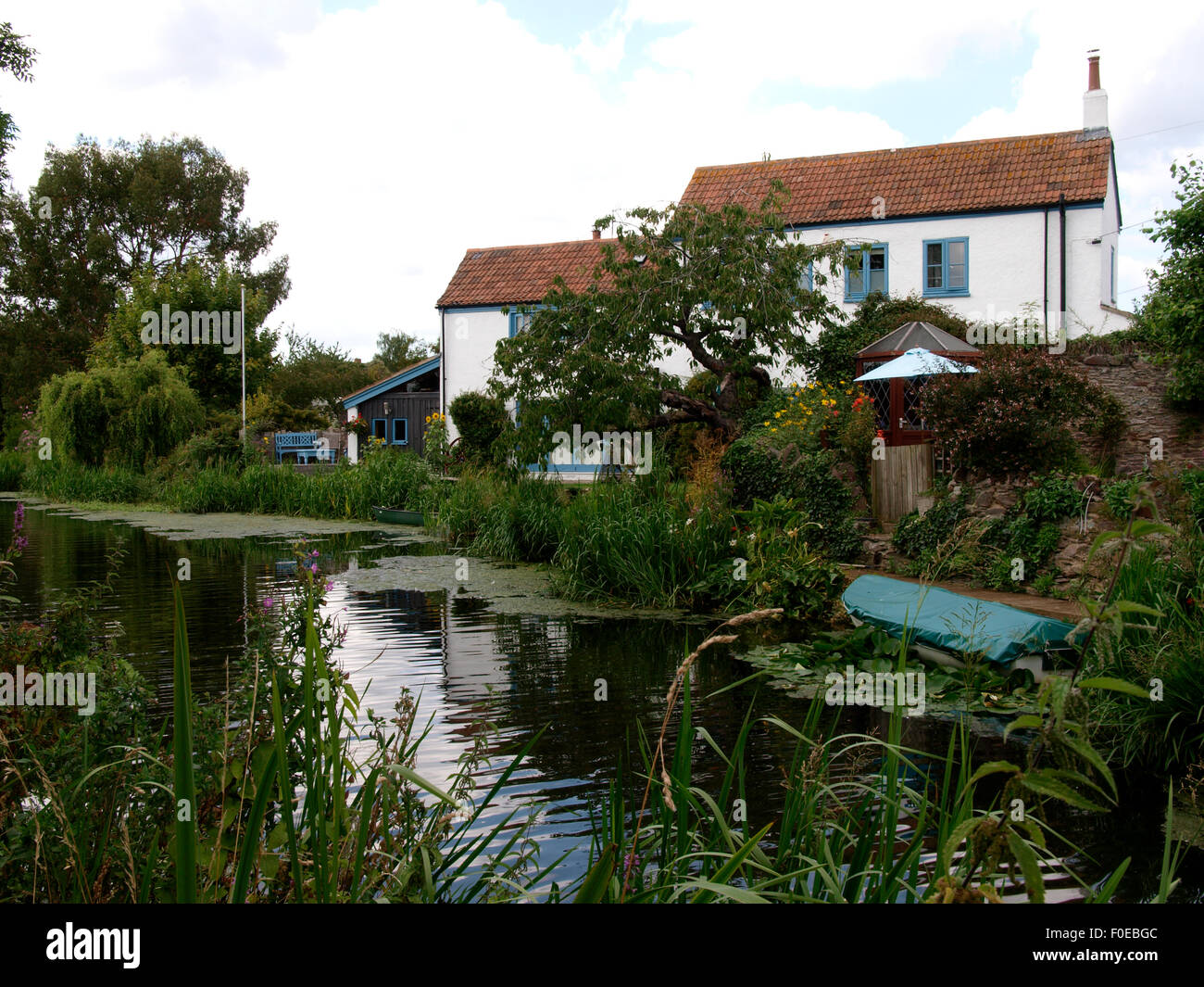 Pretty canalside house on the Bridgwater and Taunton Canal, Somerset, UK Stock Photo