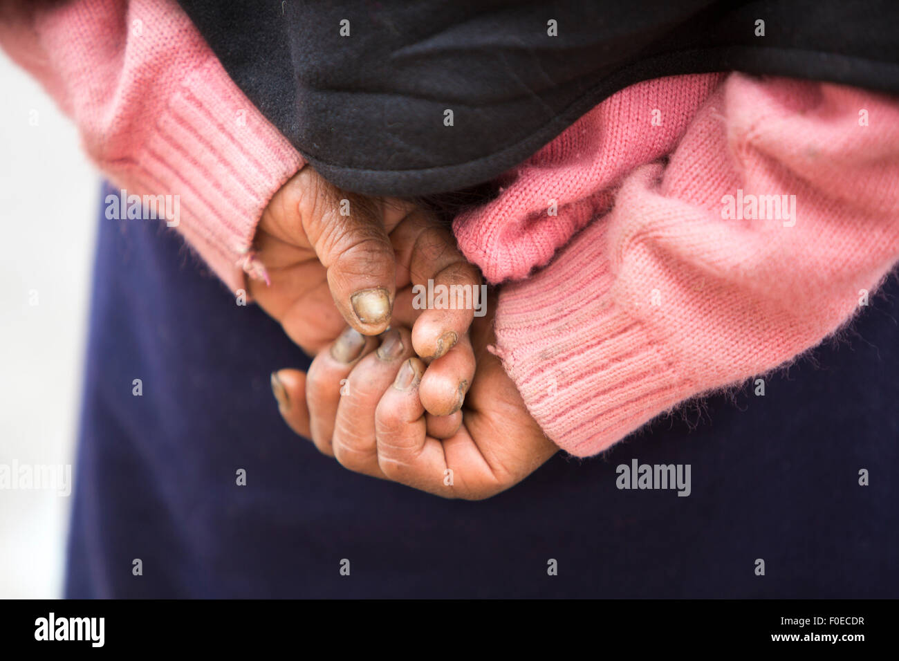 Close-up of old woman hands from the Mestizo ethnic group, famous for their art and music. Ecuador 2015. Stock Photo