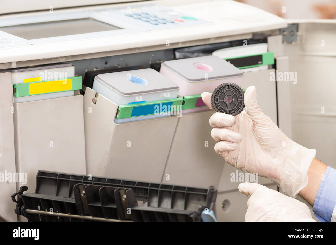 closeup shot technician fixing broken photocopier machine Stock Photo ...