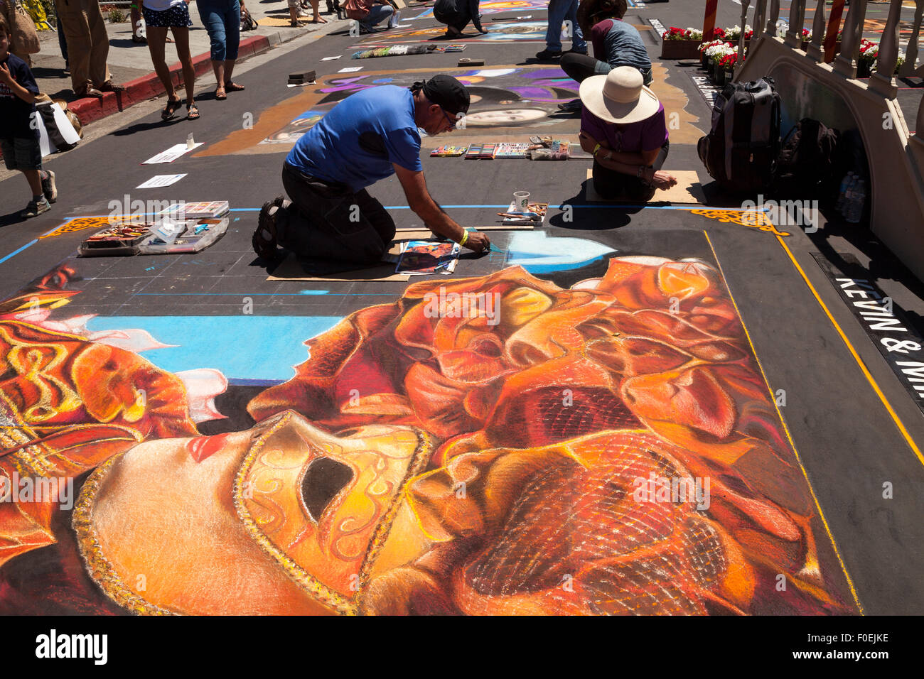 Artists at work at Italian Street Painting, San Rafael, California, USA Stock Photo