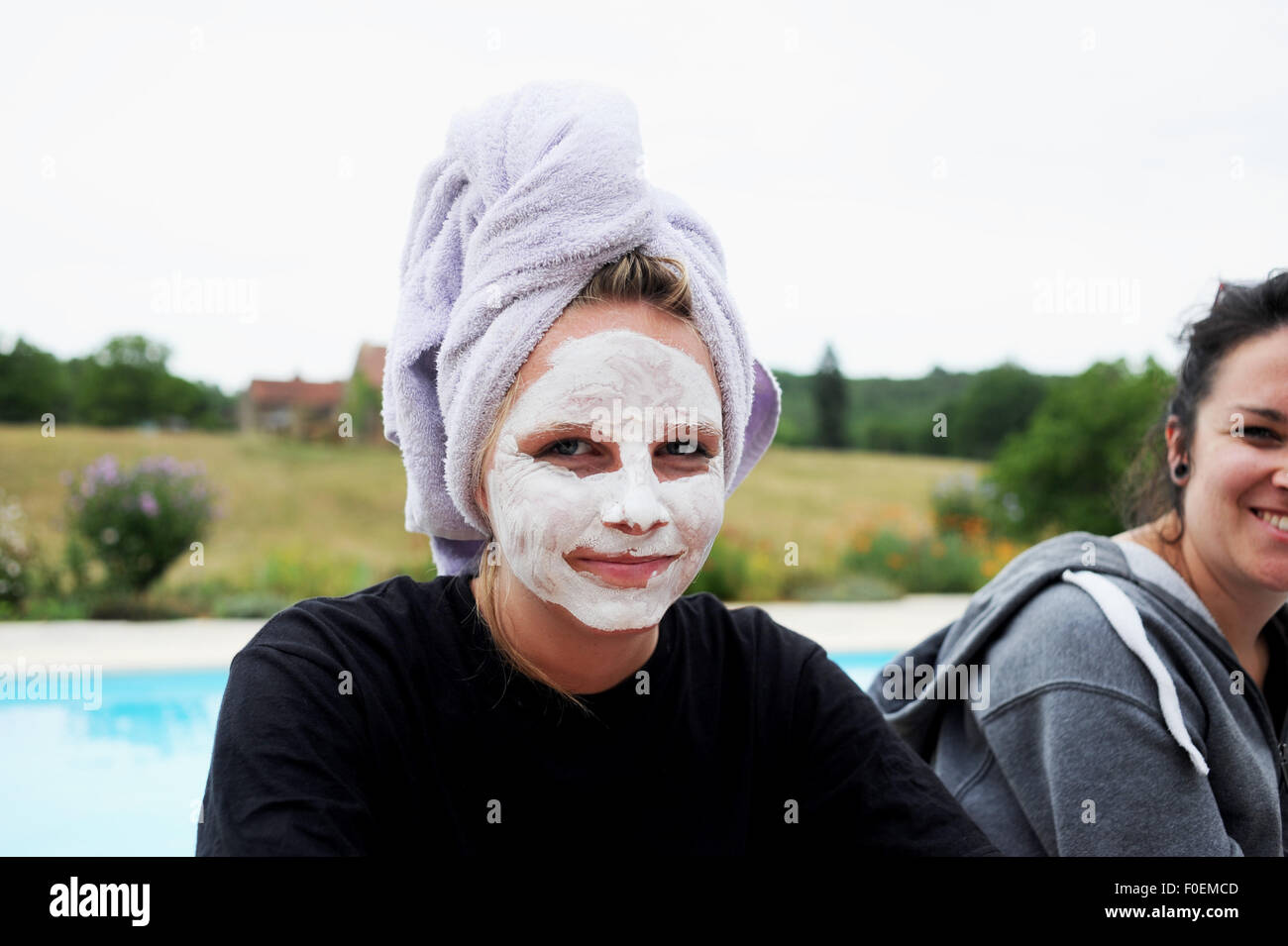 Young teenage girl 15 wearing a face mask health and beauty Stock Photo