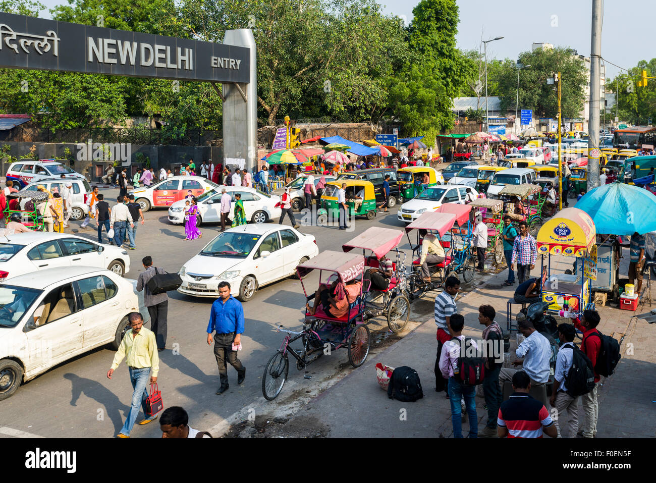 Cars, busses and cycle rickshaws are cought in the traffic jam in front of New Delhi Railway Station, New Delhi, Delhi, India Stock Photo
