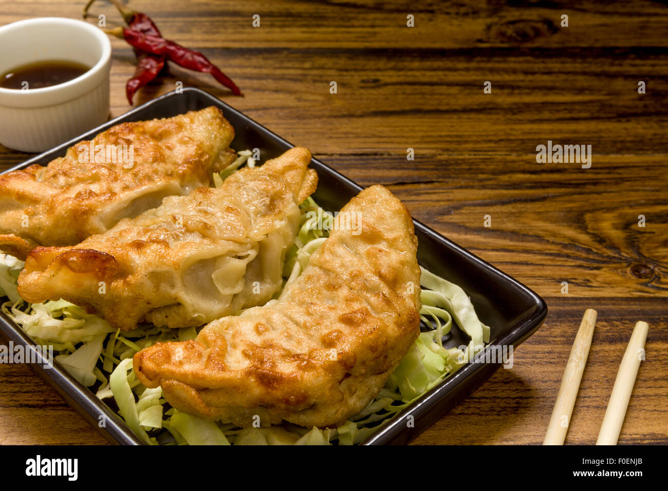 Gyoza, traditional pork dumpling, eaten with soy sauce popular in Japan and China Stock Photo