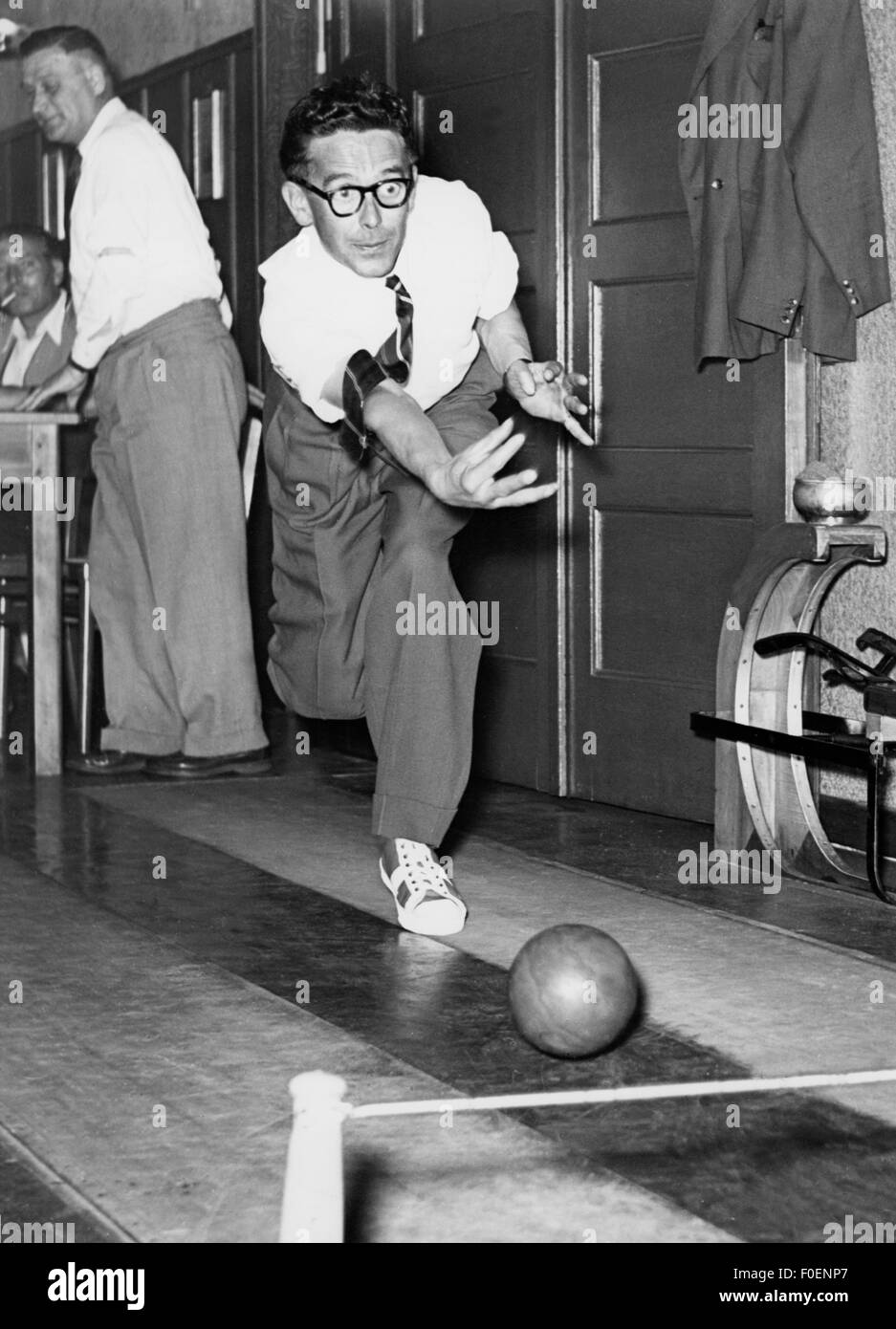 game, bowling and bocce, man playing skittles, 1960s, Additional-Rights-Clearences-Not Available Stock Photo
