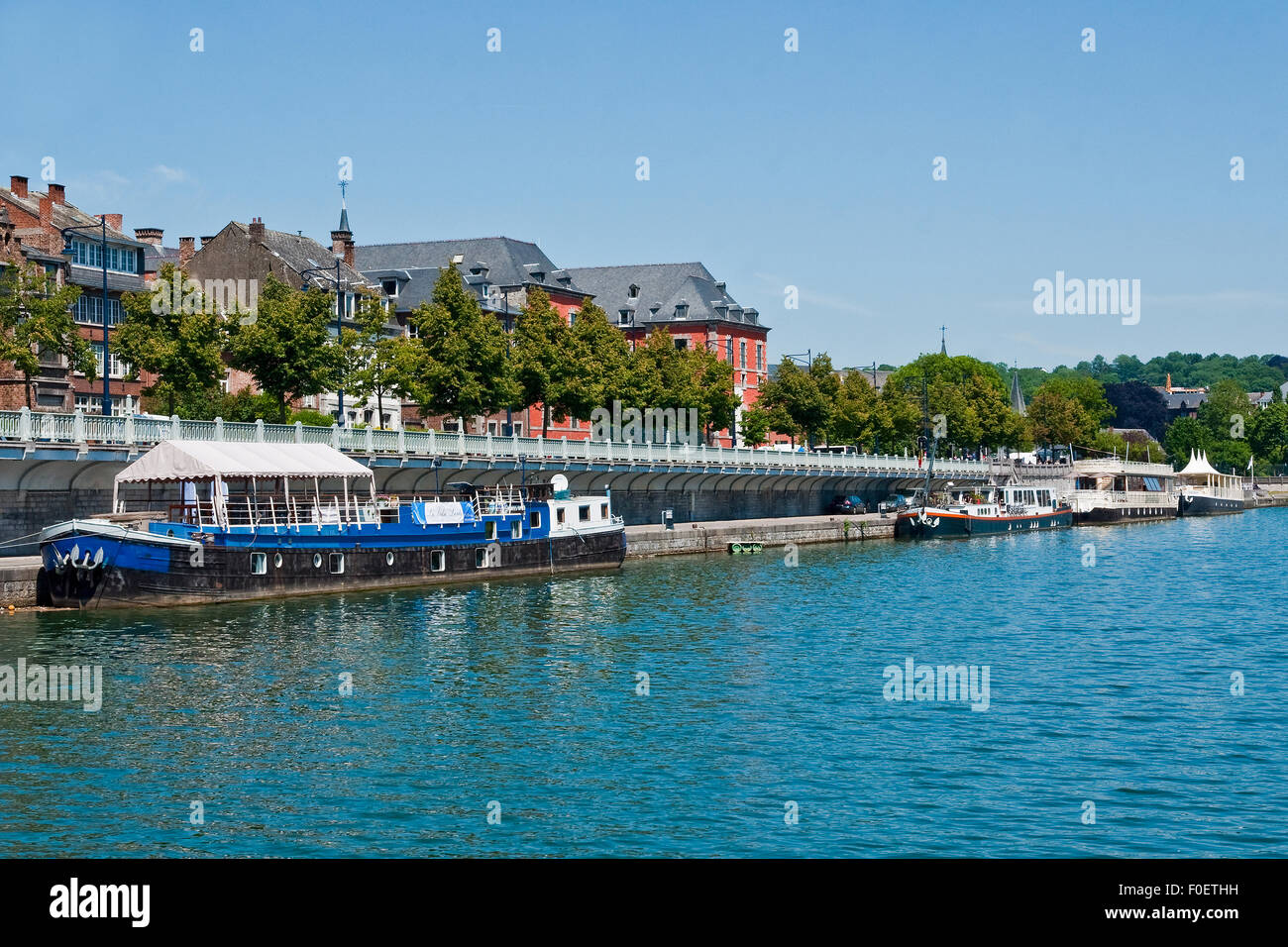 Hotel and event boats moored on the River Meuse in Namur, Belgium Stock Photo