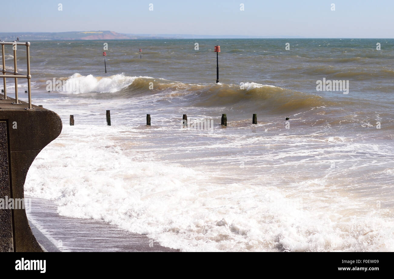 England With Groynes And Sea Wall Stock Photos & England With Groynes
