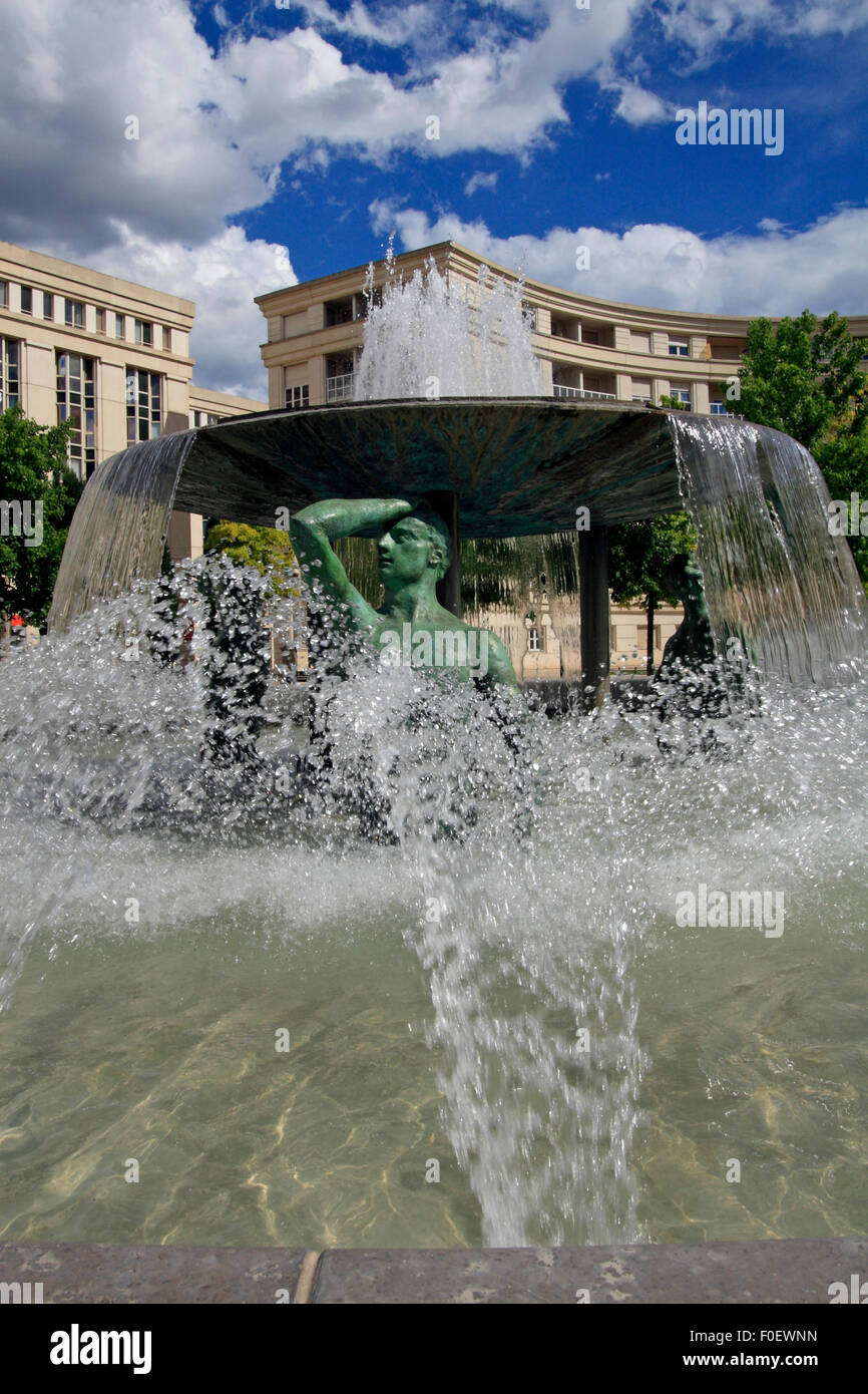 Fountain 'Les Ephebes , square of Thessaly in Montpellier, Languedoc-Roussillon, France Stock Photo