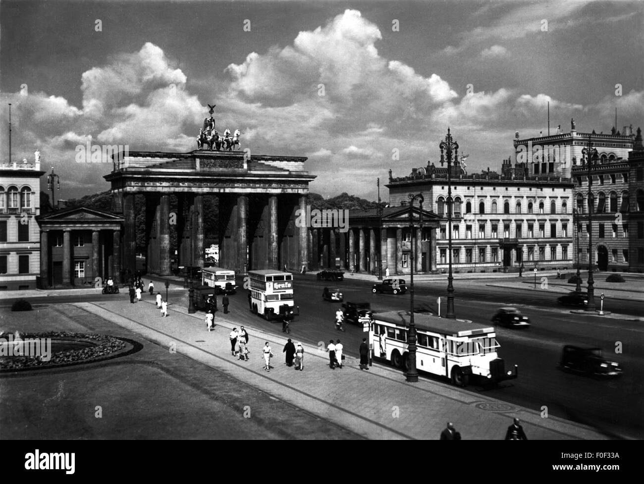geography / travel, Germany, Berlin, square, Pariser Platz with Brandenburg Gate, late 1930s, 30s, 20th century, historic, historical, transport, transportation, street scene, street scenes, pedestrian, pedestrians, passer-by, passerby, passers-by, motor coach, quadriga, double decker, double-decker bus, double deckers, double-decker buses, double-decker busses, city traffic, metropolis, capital, capital city, capitals, capital cities, inner city, midtown, city centre, town centre, urban core, landmark, landmarks, people, nostalgia, Additional-Rights-Clearences-Not Available Stock Photo