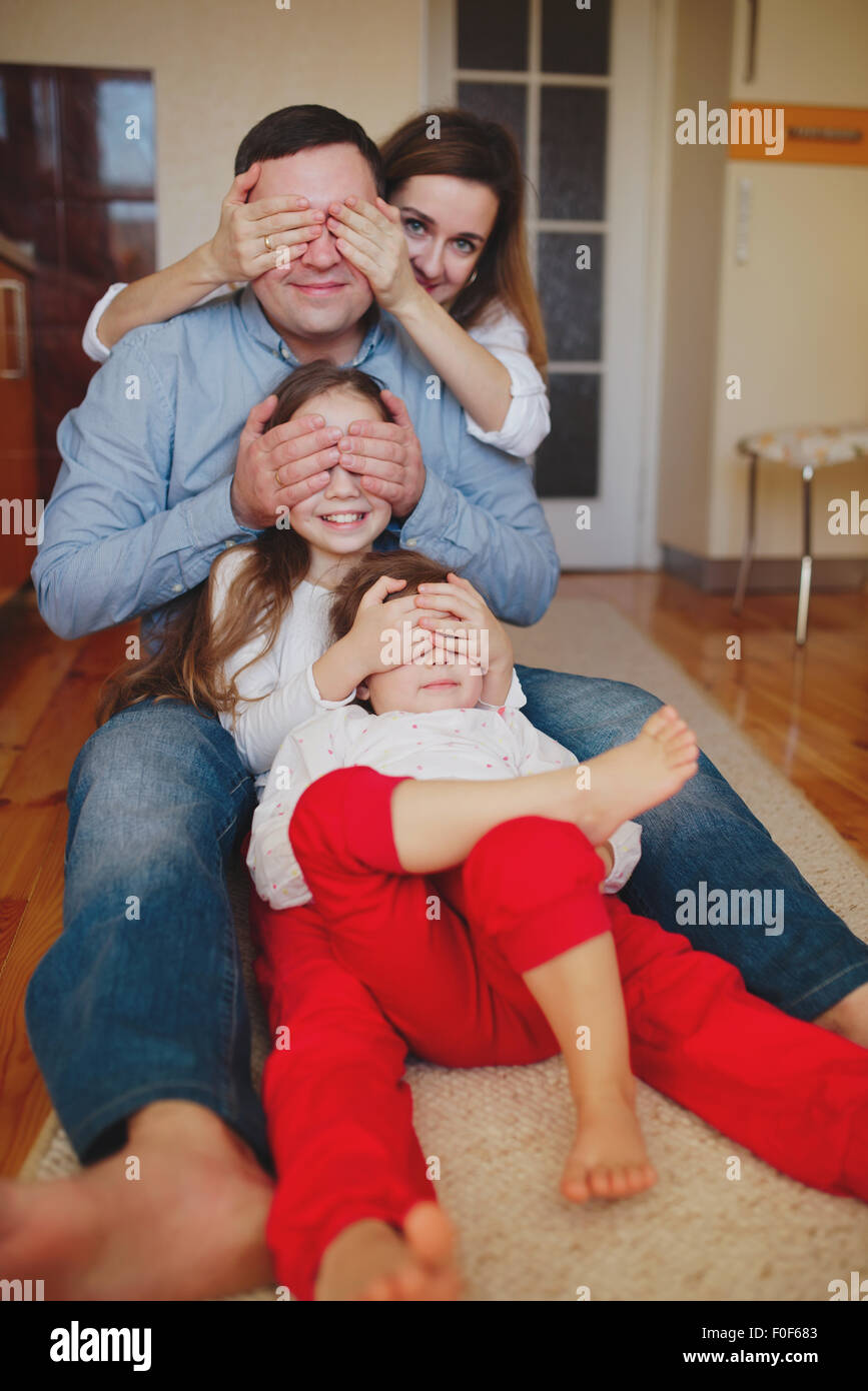 happy family at home on the floor Stock Photo