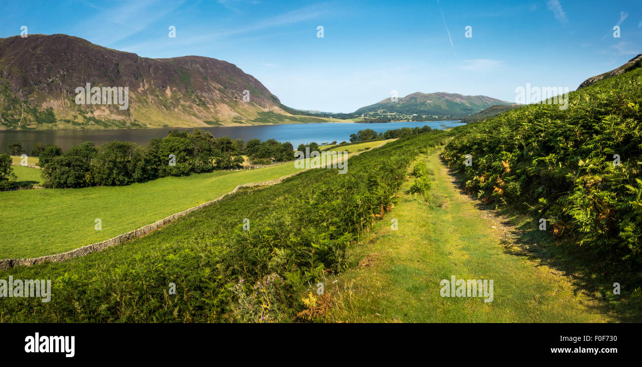 Looking north down Crummock Water with Mellbreak hill (Wainwright) on the left hand side in the English Lake District Stock Photo